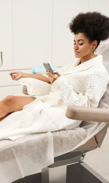 woman relaxing during IV treatment